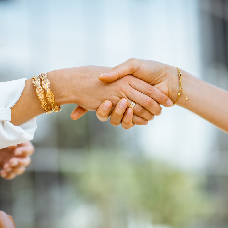 Businesswomen Shaking Hands Outdoors 2025 03 13 04 44 13 Utc
